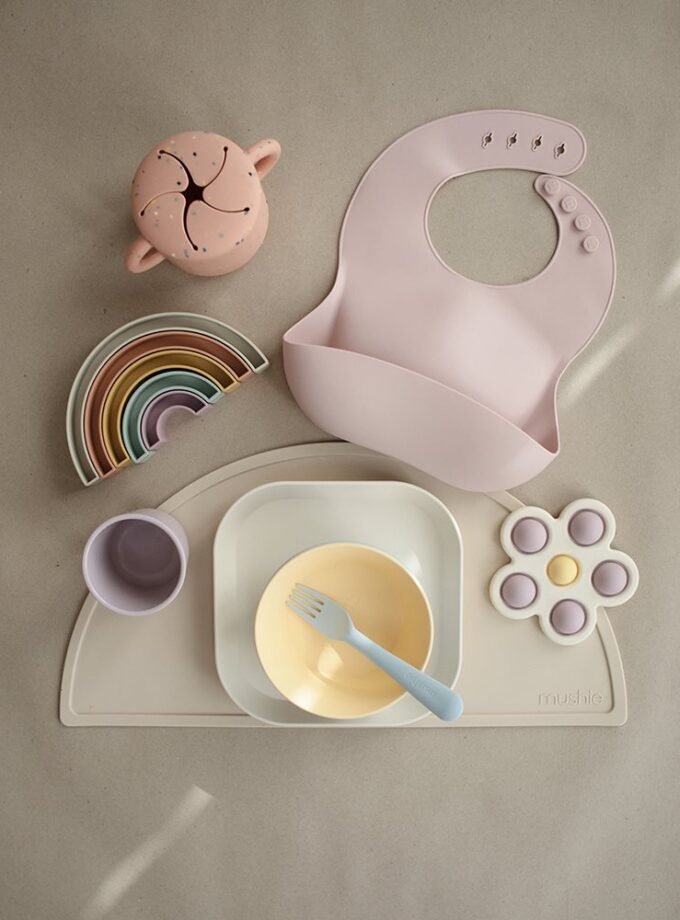 Mushie Flower spaudžiamasis žaislas - Soft Lilac/Pale Daffodil/Ivory