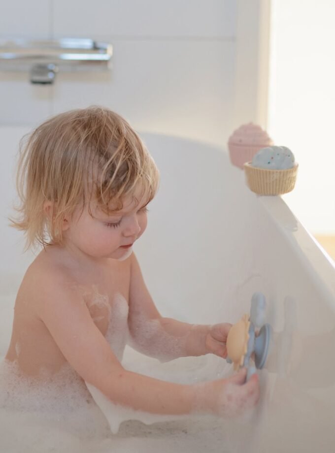 Mushie prilimpantis žaislas - Spinner - Sunshine